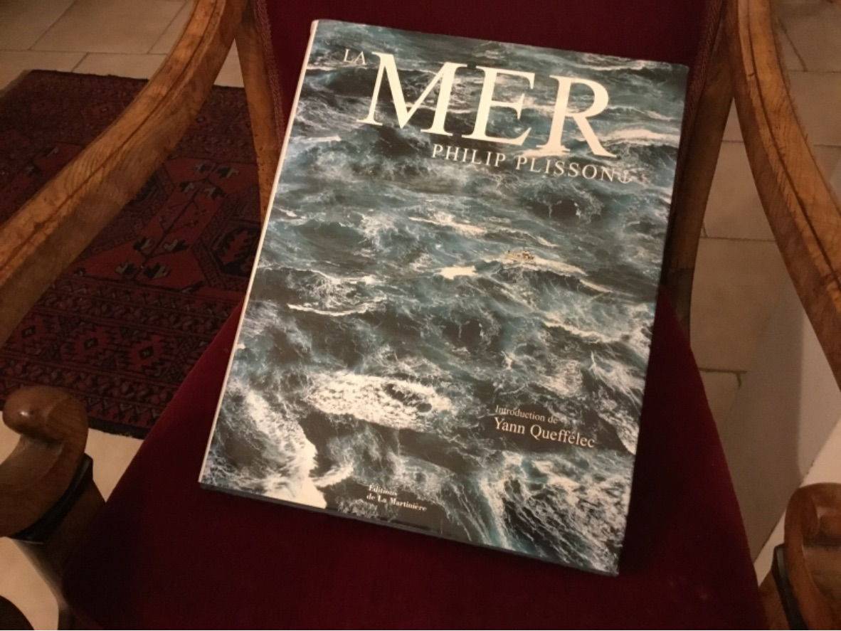 Vends 2 livres, la Mer et la Terre vues du ciel