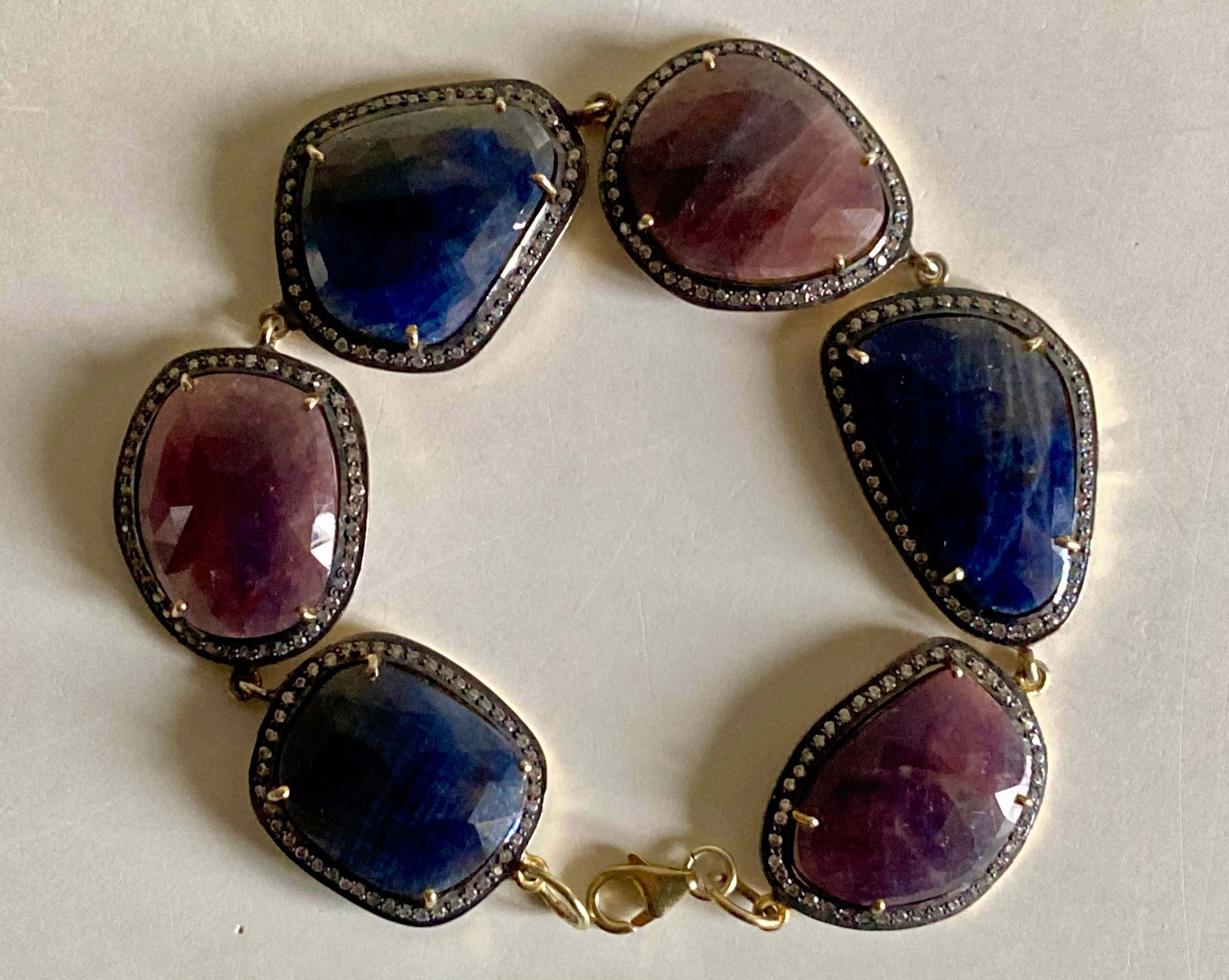 Vends bracelet à maillons en argent massif doré et noirci serti de cabochons facettés et de diamants