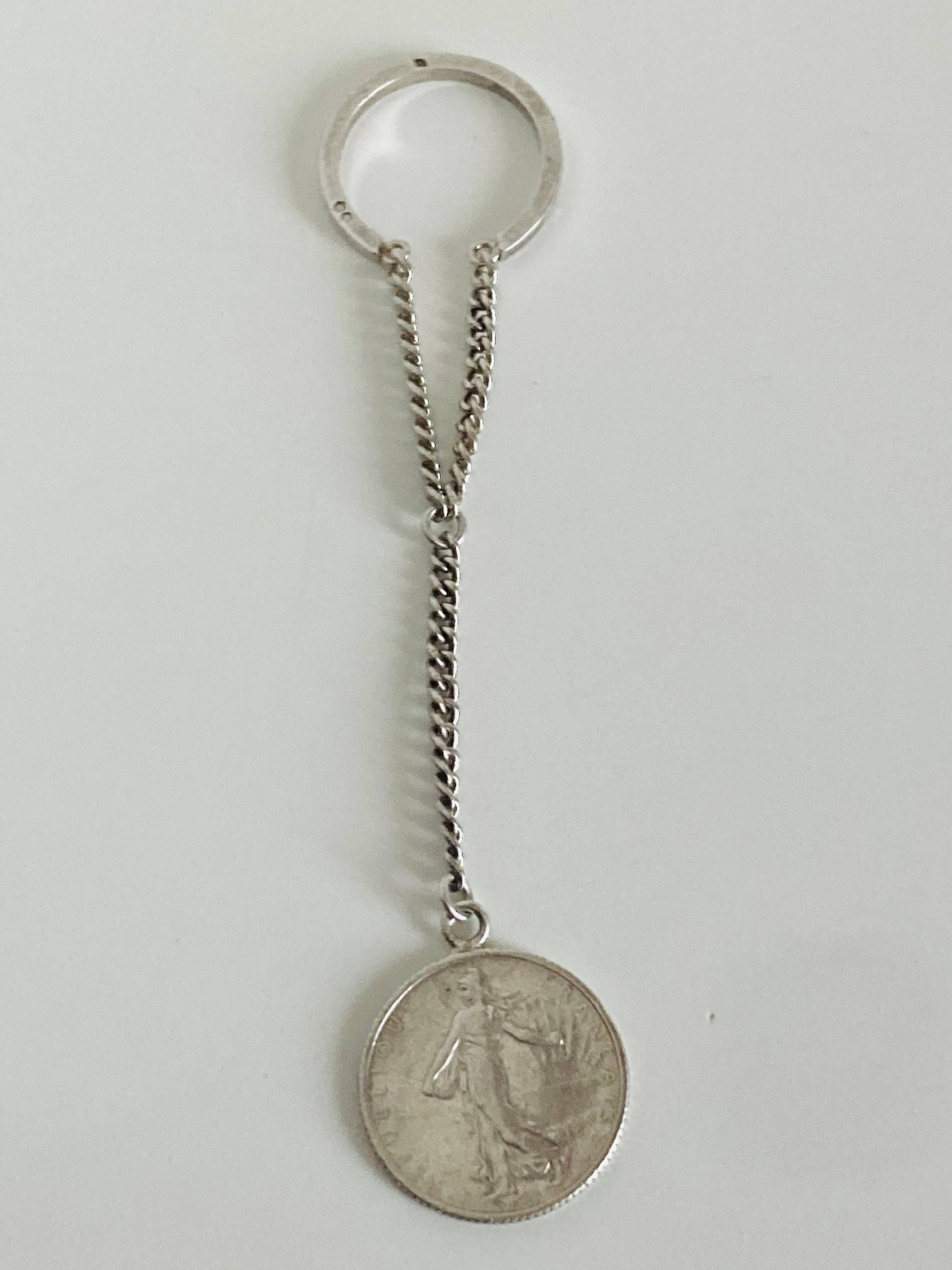 Vends porte-clés vintage en argent massif pièce 1F