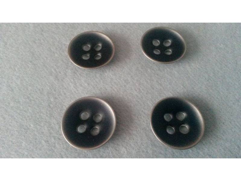 Vends lot 4 boutons métalliques neufs