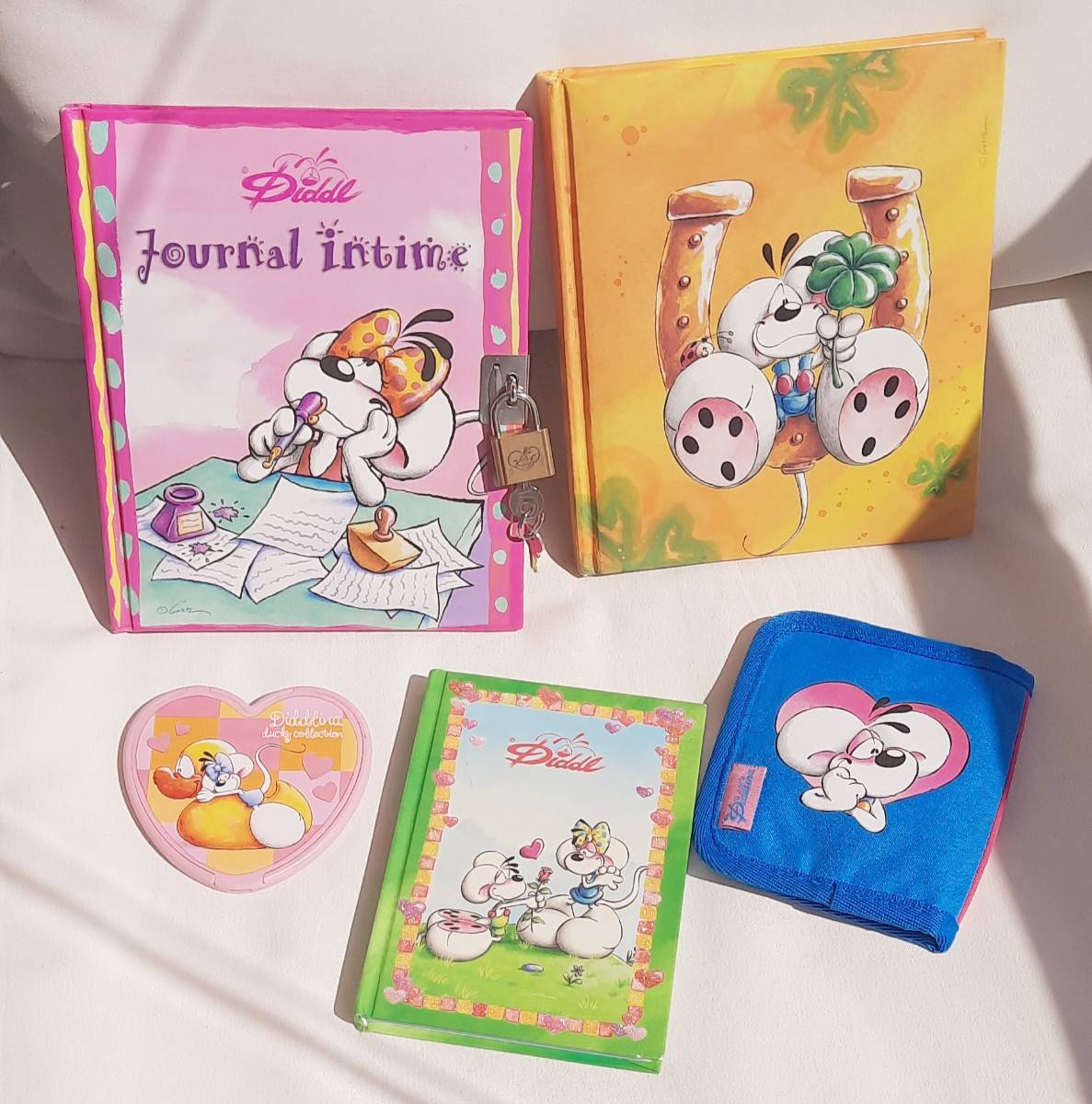 Vends lot d’articles neufs Diddle (papeterie, porte-monnaie, miroir…)