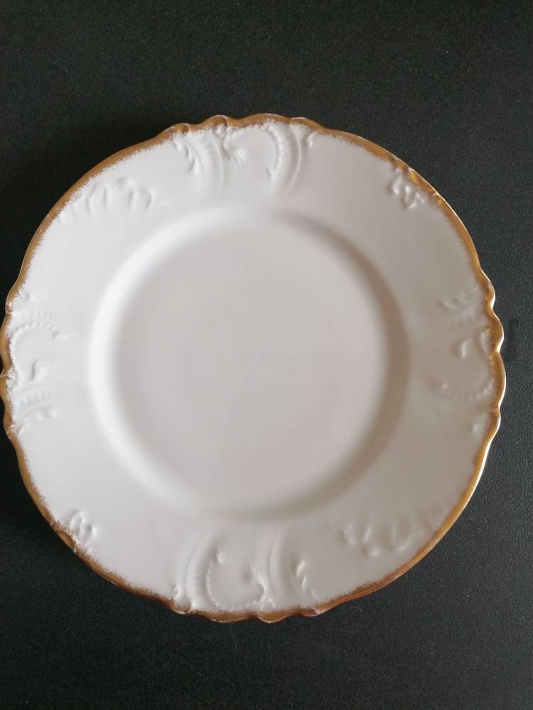 Vends 12 assiettes plates limoges