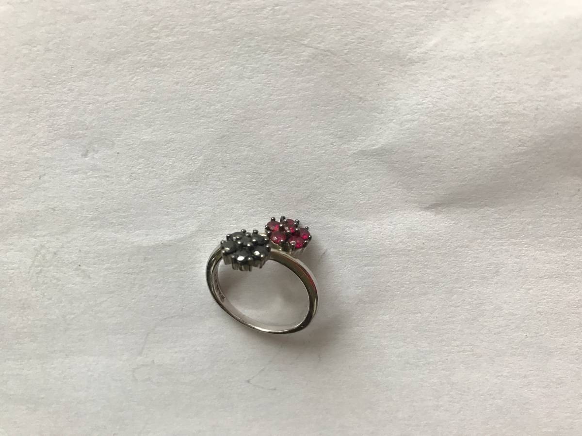 Vends bague argent fleurs roses et noires Folli Follie