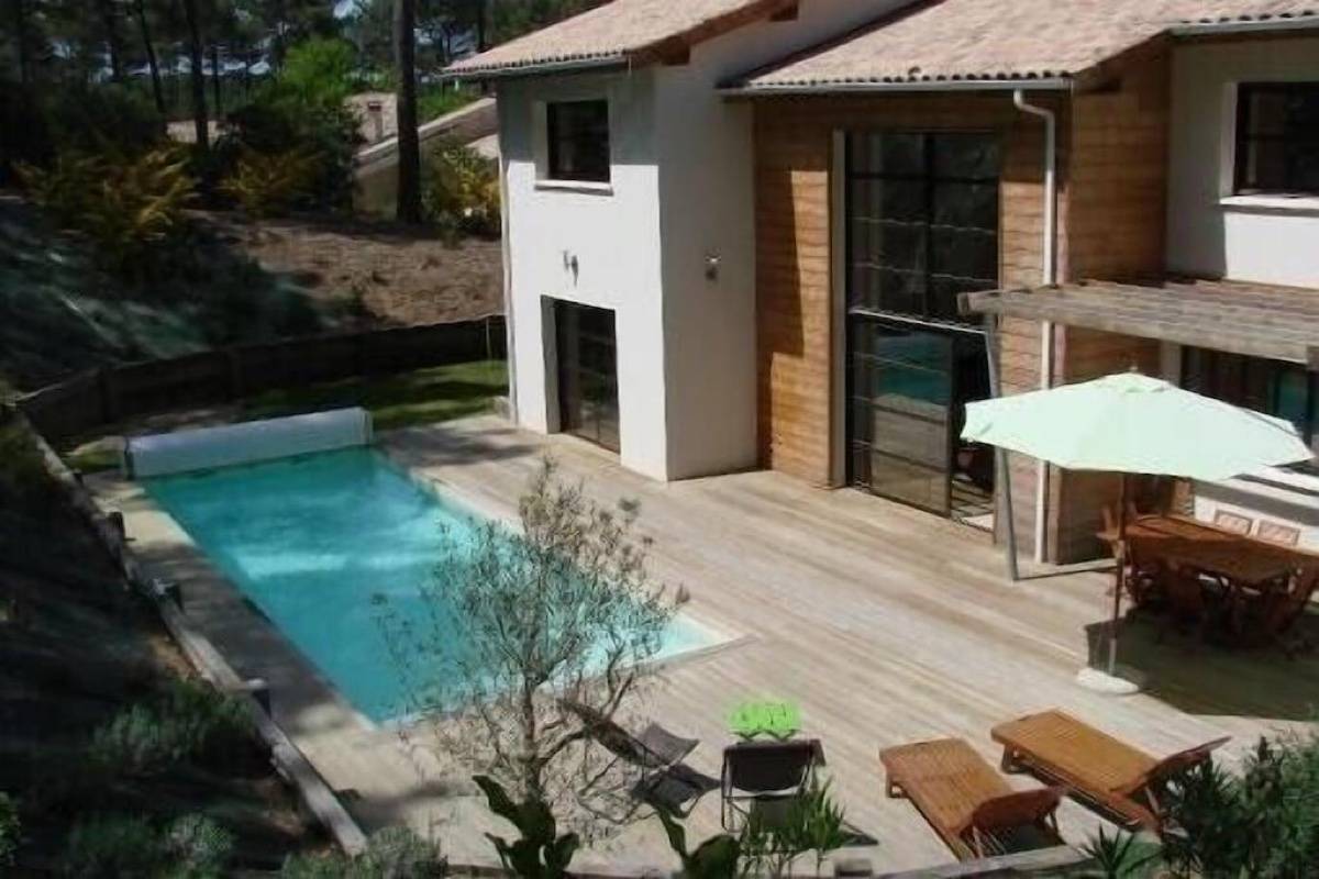 Loue villa haut de gamme avec piscine chauffée sur le golf au milieu des pins - 10 couchages