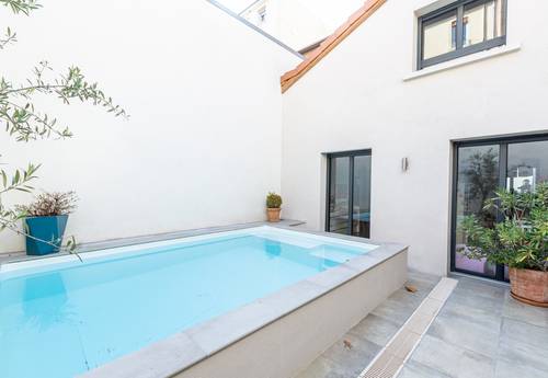 Vends Lyon 6ème, Bellecombe, loft de 154m² avec cour et bassin chauffé