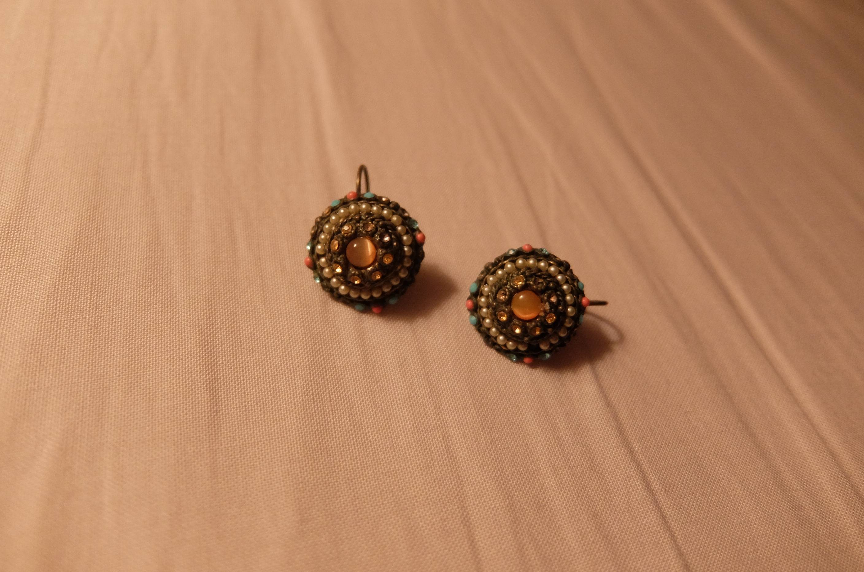 Vends boucles d’oreilles marque Status Quo