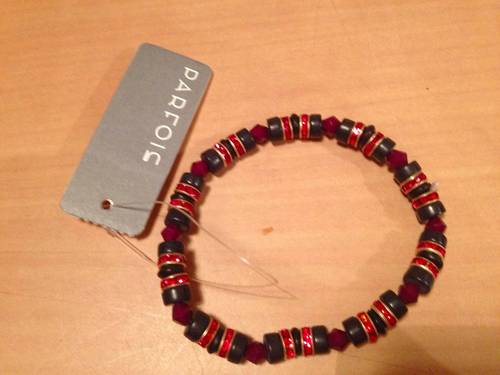 Vends bracelet fantaisie camaïeu rouge marque Parfois neuf
