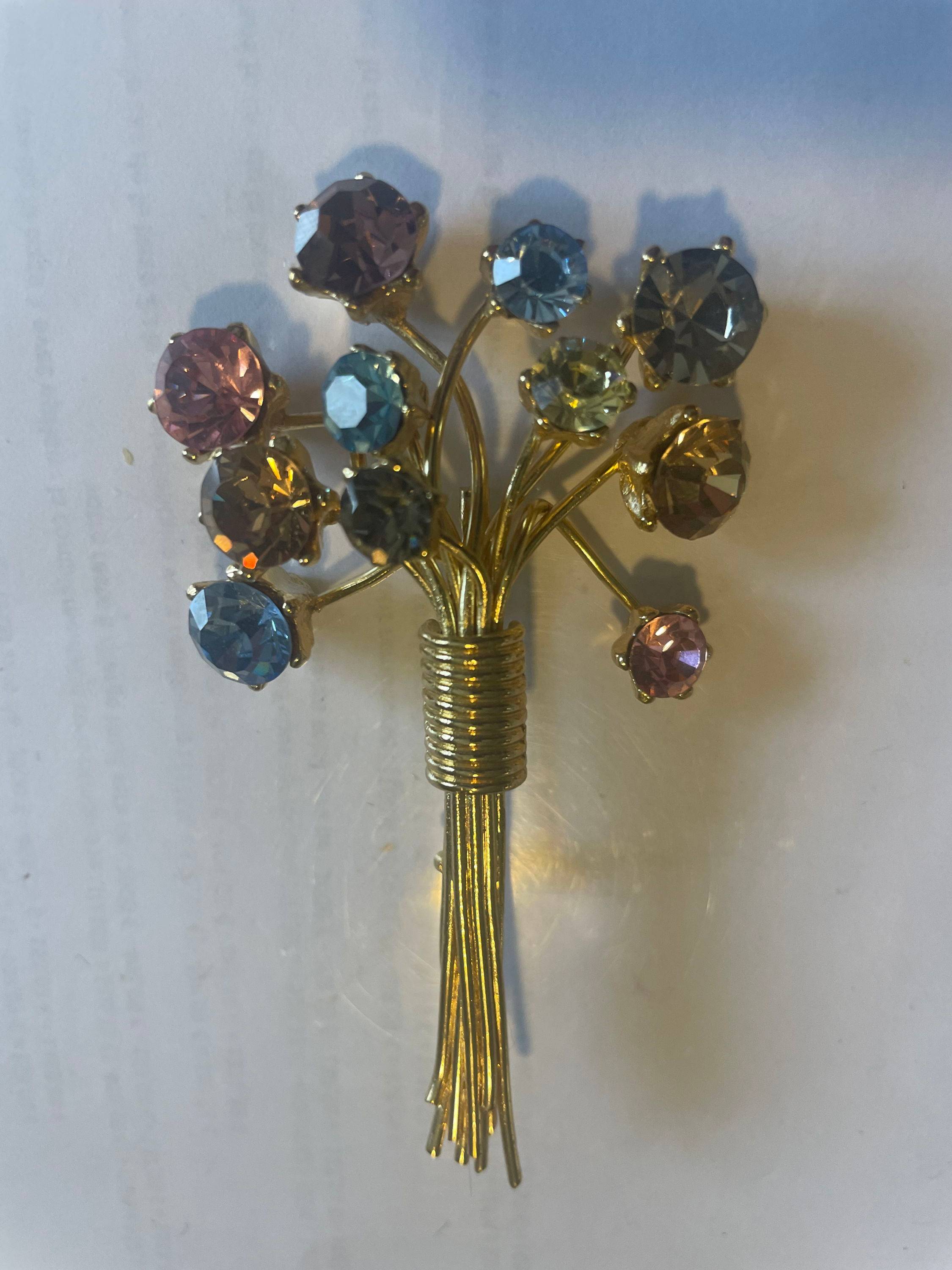 Vends broche bouquet de fleurs dorée avec strass multicolore Sonia Rykiel