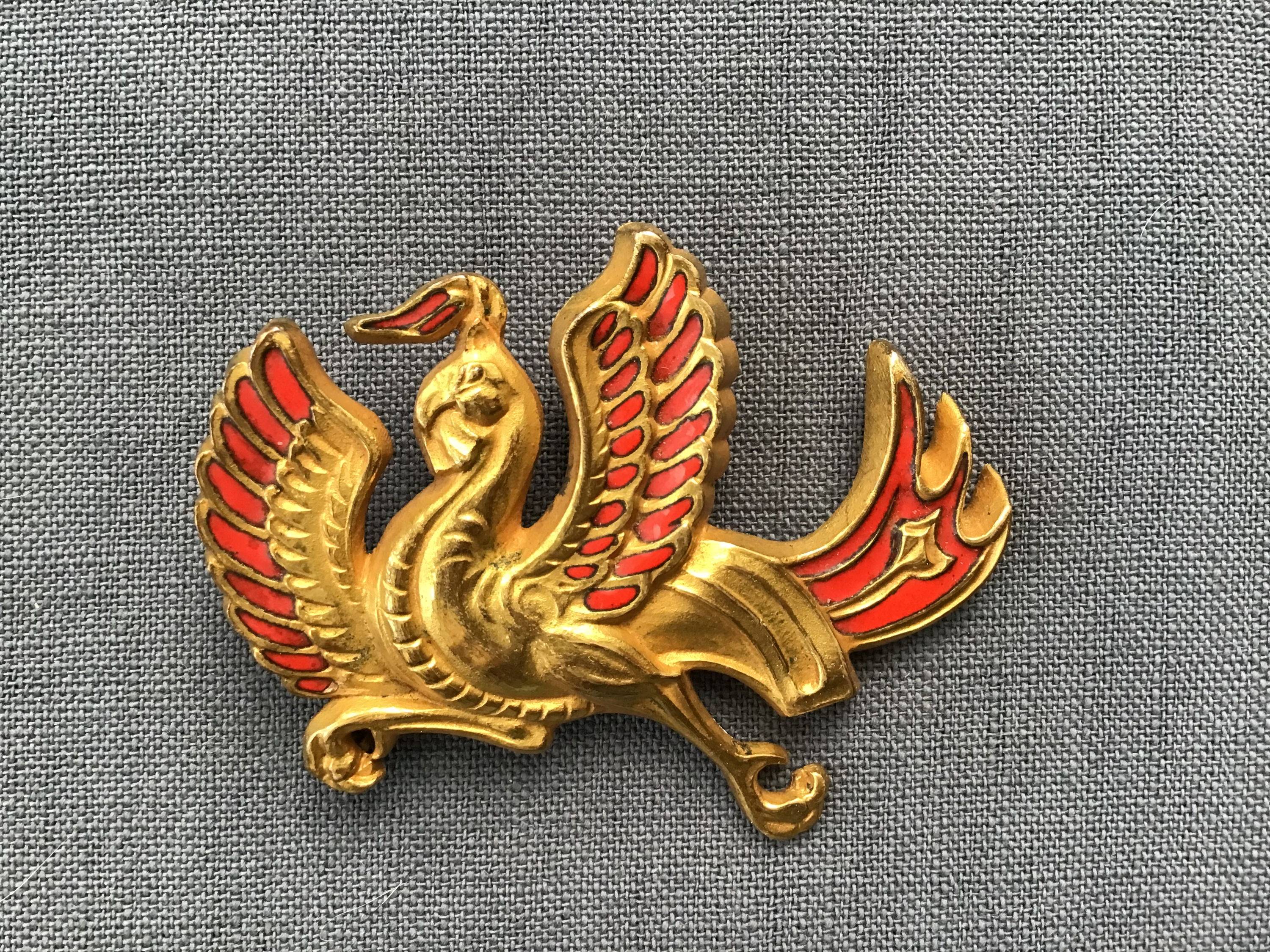 Broche en bronze, plaqué or « Arthus Bertrand »