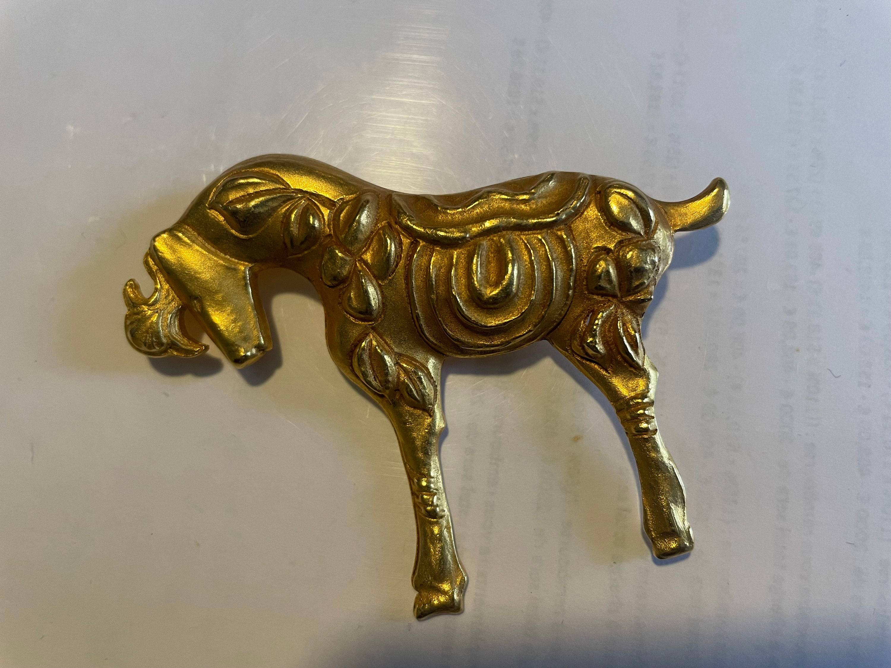 Vends broche dorée Cheval E. Ungaro Paris
