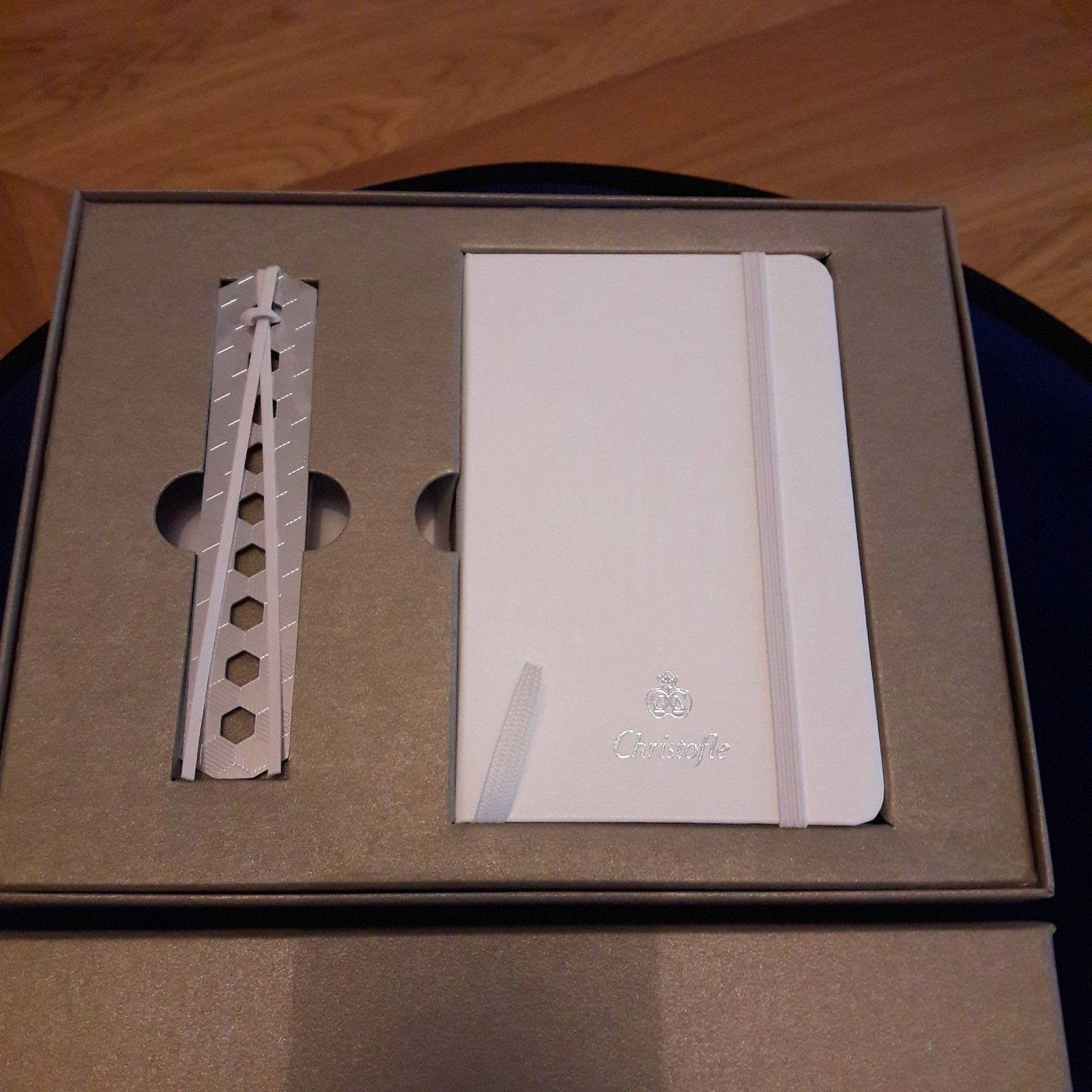 de voyage moleskine et marque page argenté Christofle neufs on