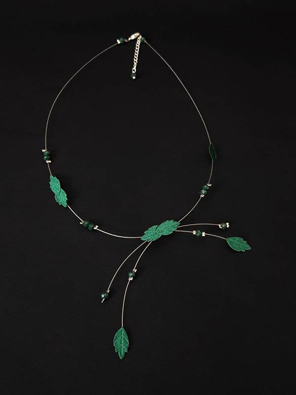 Vends collier "ras-du-cou" fantaisie vert comète