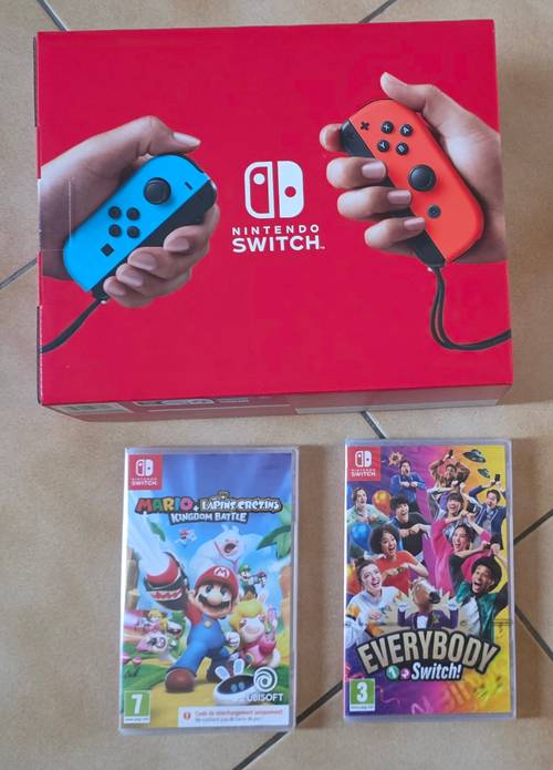 Vends switch 1 neuve + 2 jeux encore sous blister