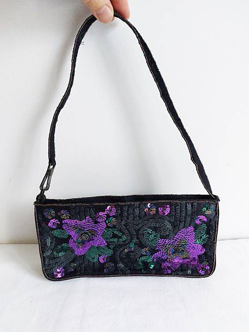 Vends sac élégant noir brodé de paillettes