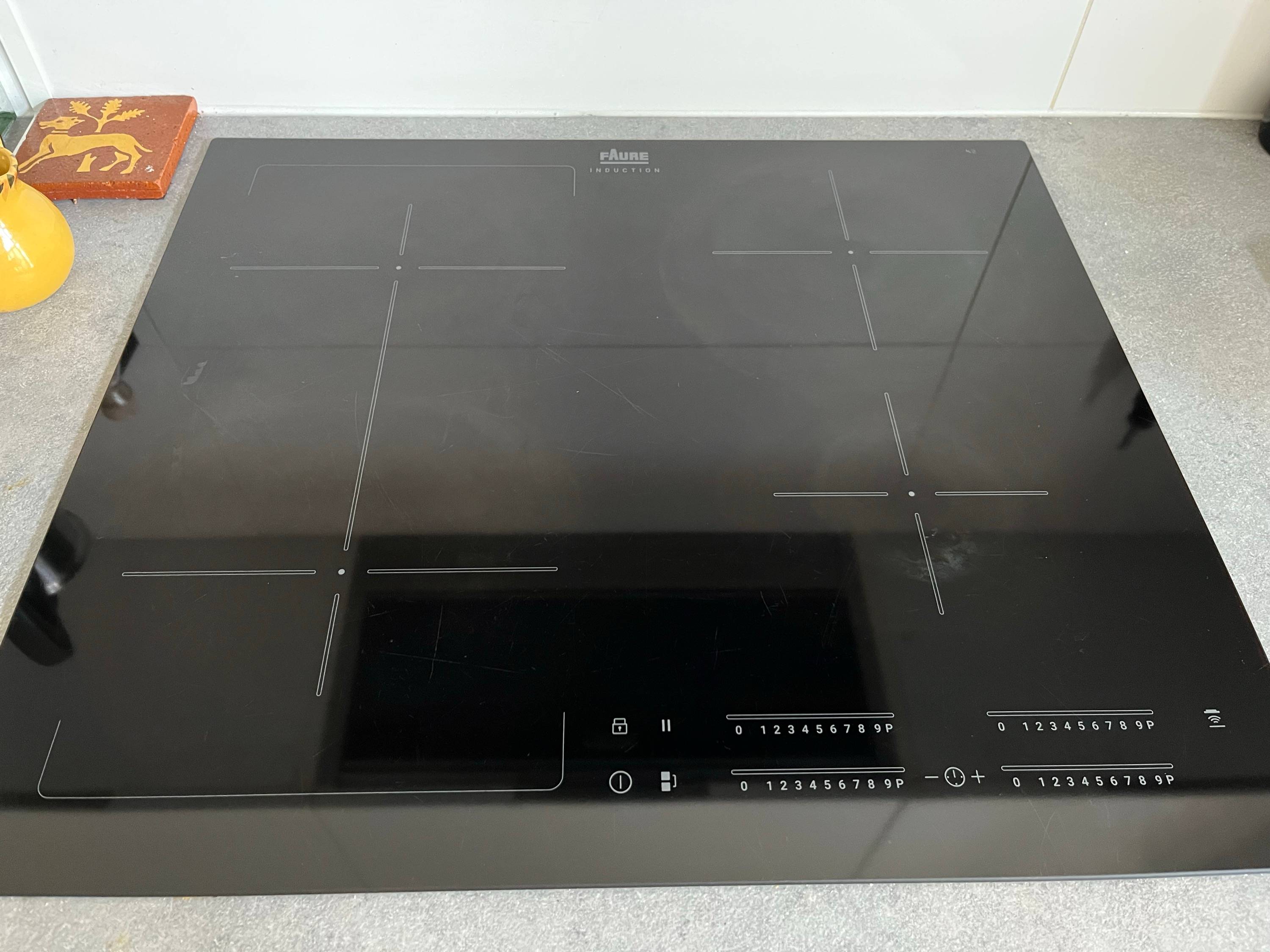 Vends table de cuisson Faure 4 feux utilisée 5 ans, état parfait