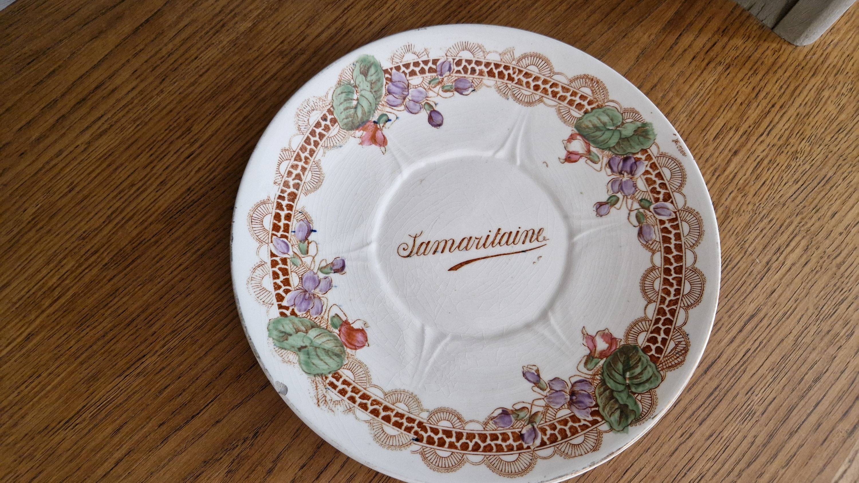 Vends assiette publicitaire Samaritaine en faïence de Longwy