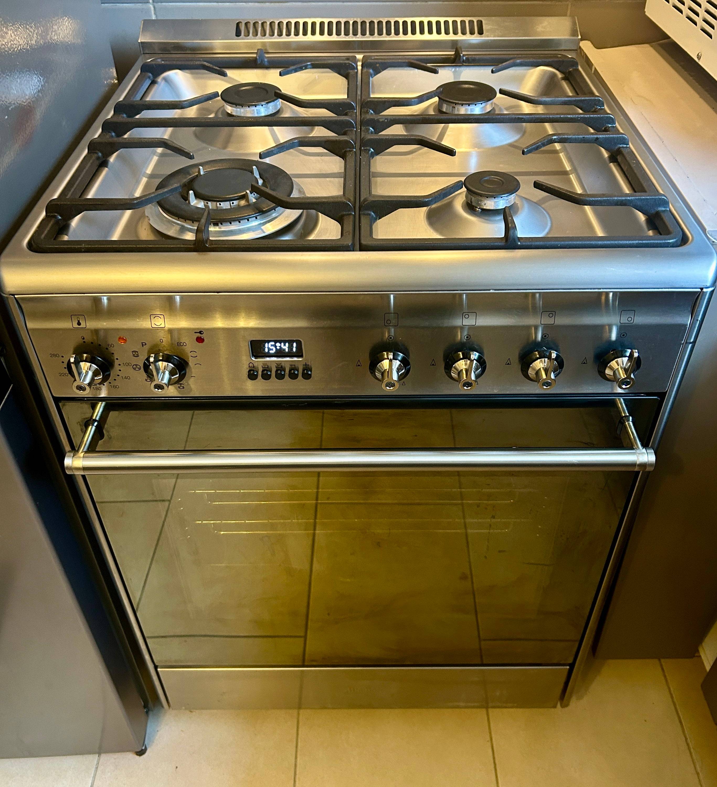 Vends cuisinière Smeg GP61X9 mixte gaz et four électrique pyrolyse