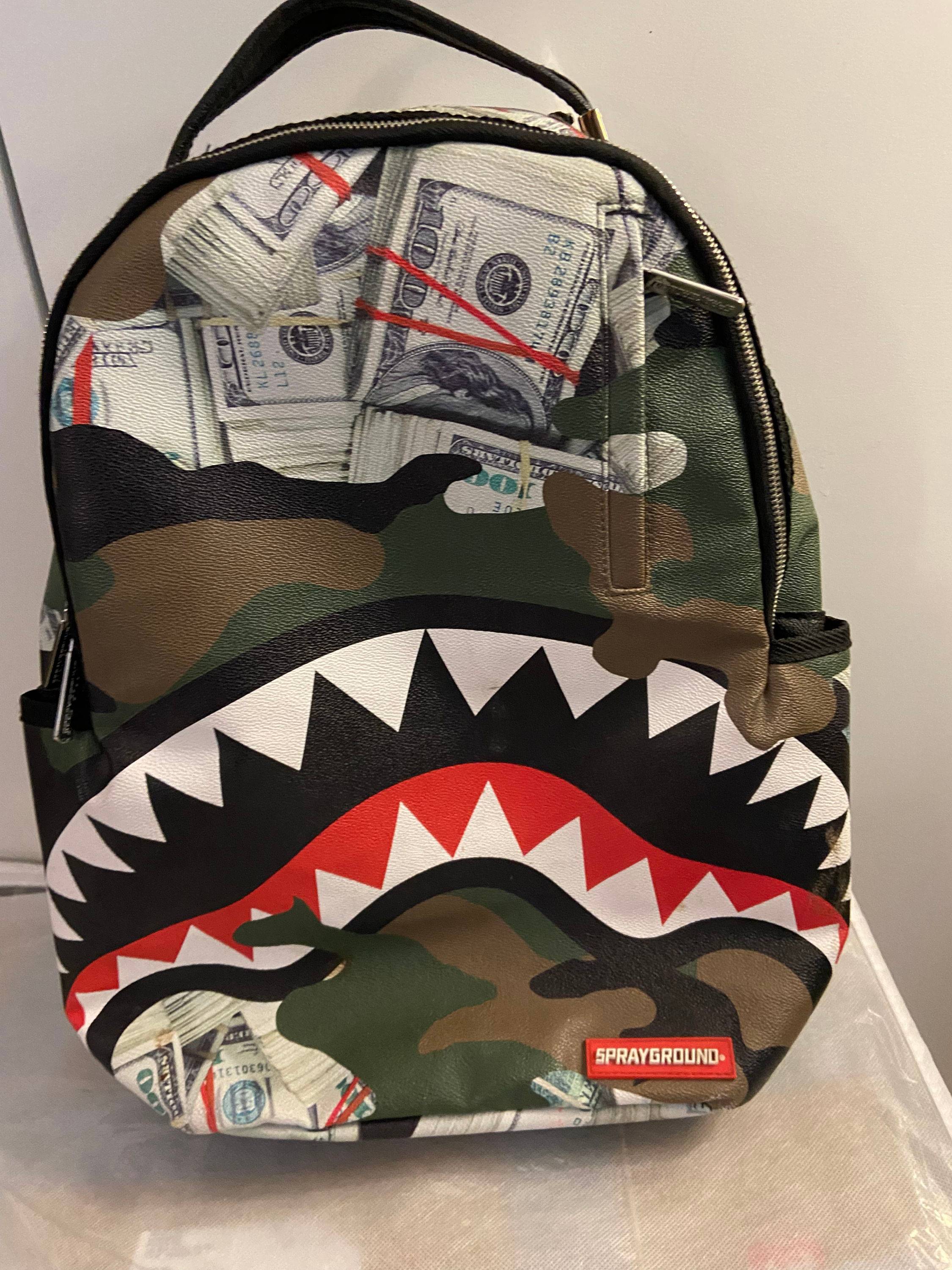 Vends sac à dos Bape Sprayground neuf