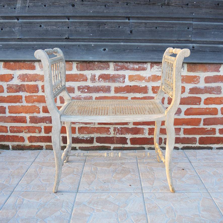 Vends ancien banc de piano Napoléon III en bois et cannage