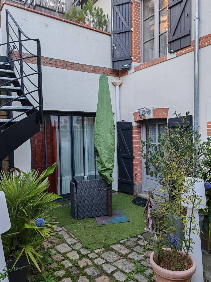 Loue appartement T2 RDC dans une cour - 2 couchages