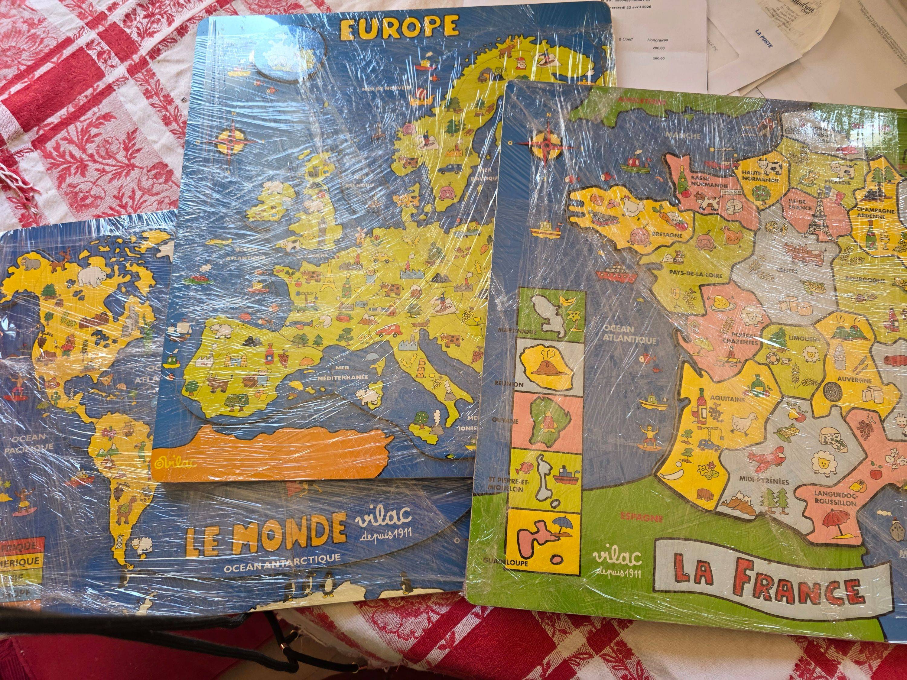Vends 3 puzzles Vilac en bois très bon état