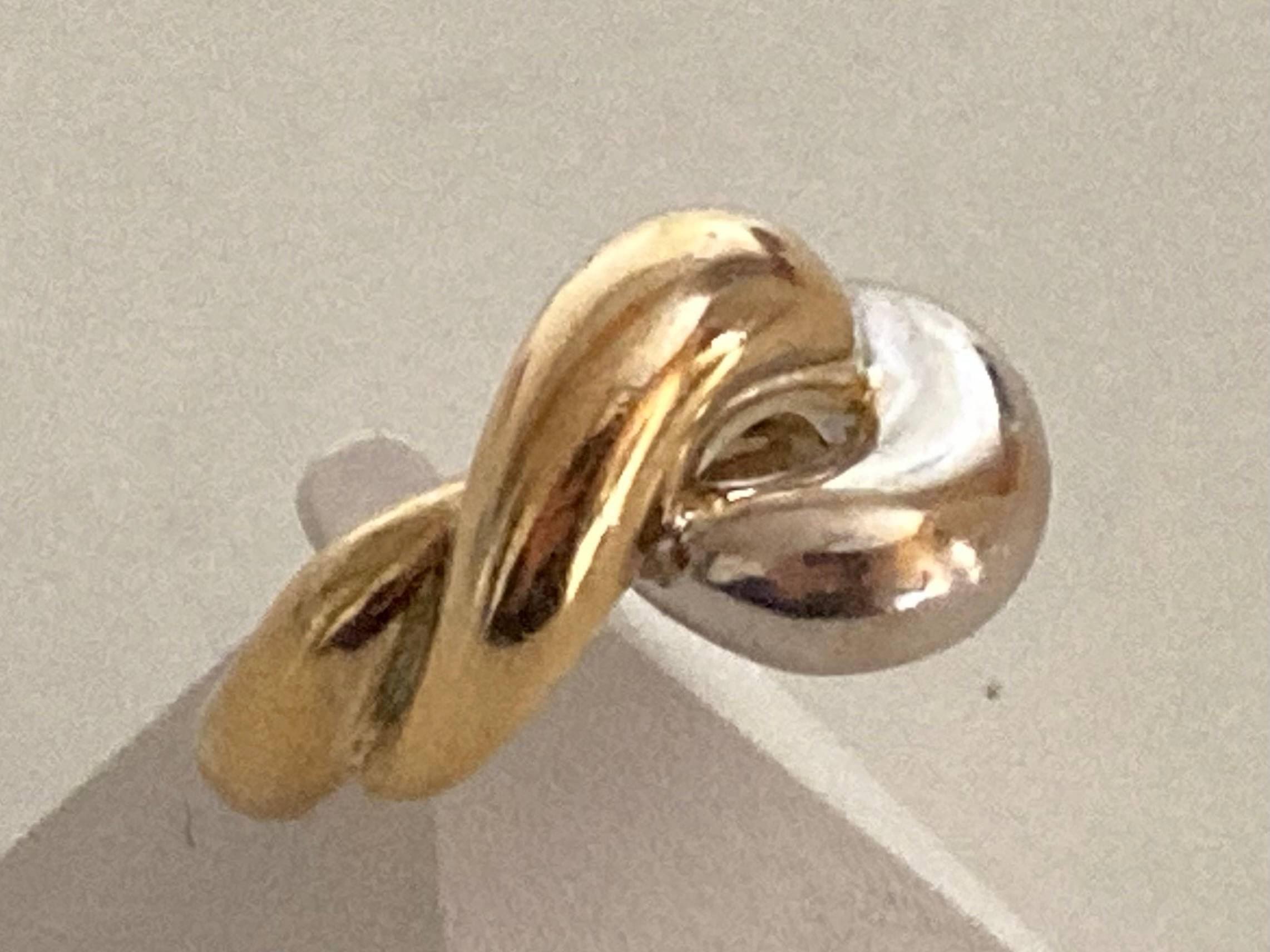 Vends bague tressée dorée argentée 57