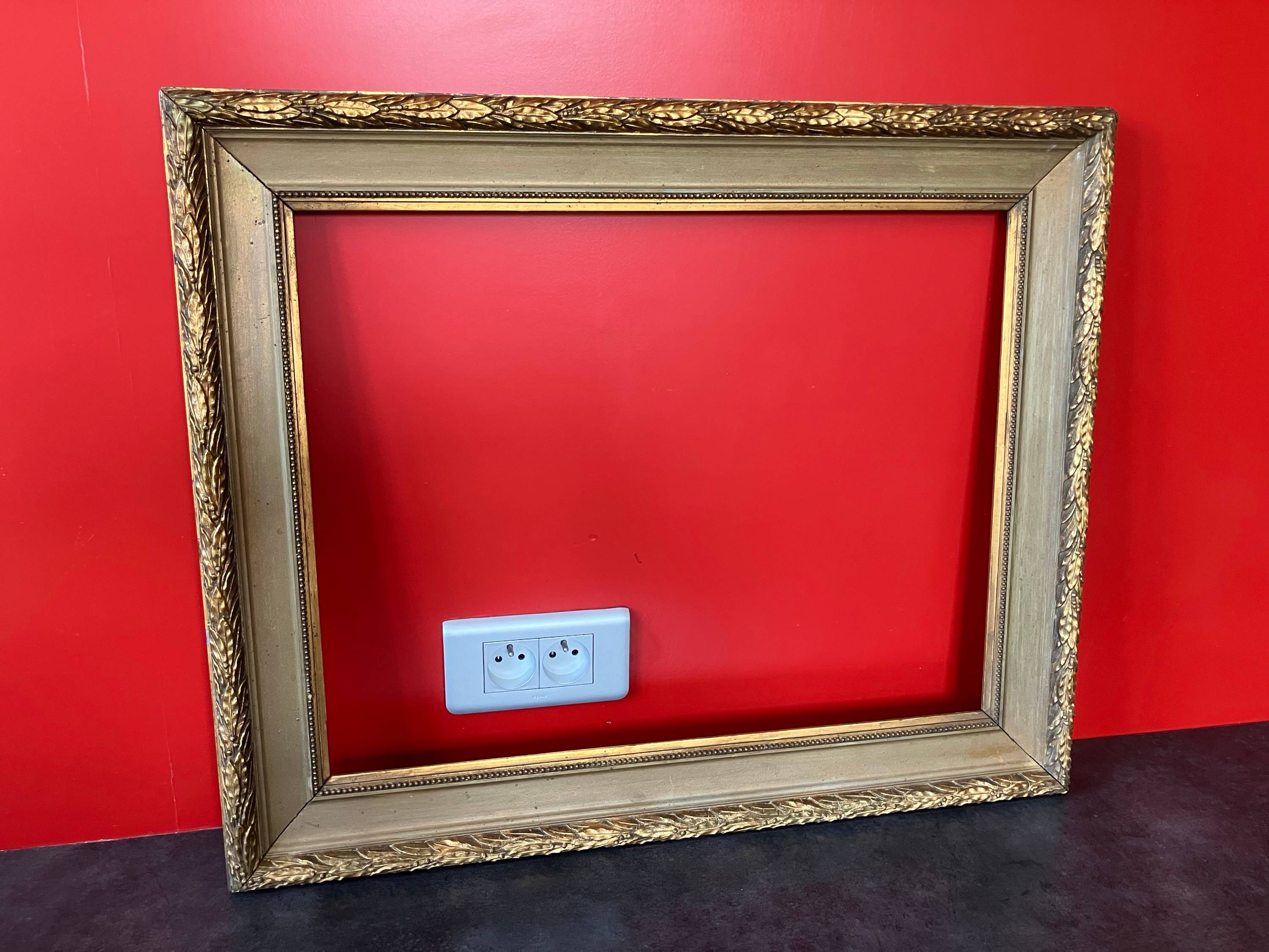 Vends ancien grand cadre en bois doré