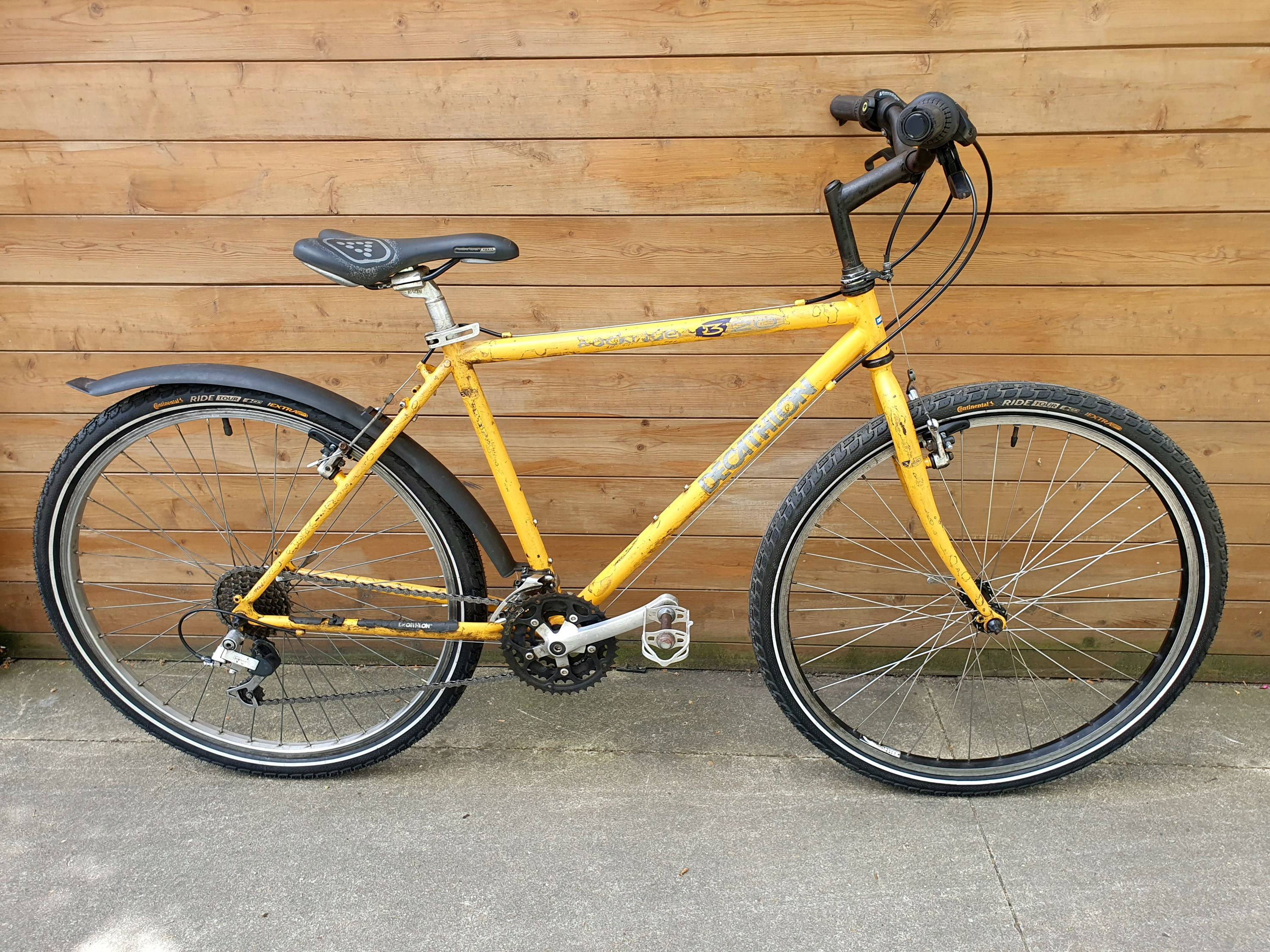 Vends randonneuse tout chemin Decathlon, pneus Continental neufs, cadre acier pour 1,50m à 1,60m