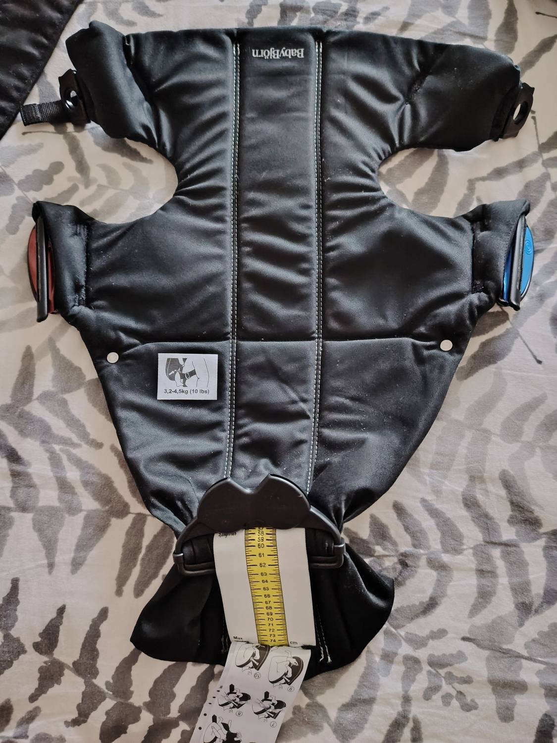 Vends porte-bébé Mini Babybjörn en coton noir