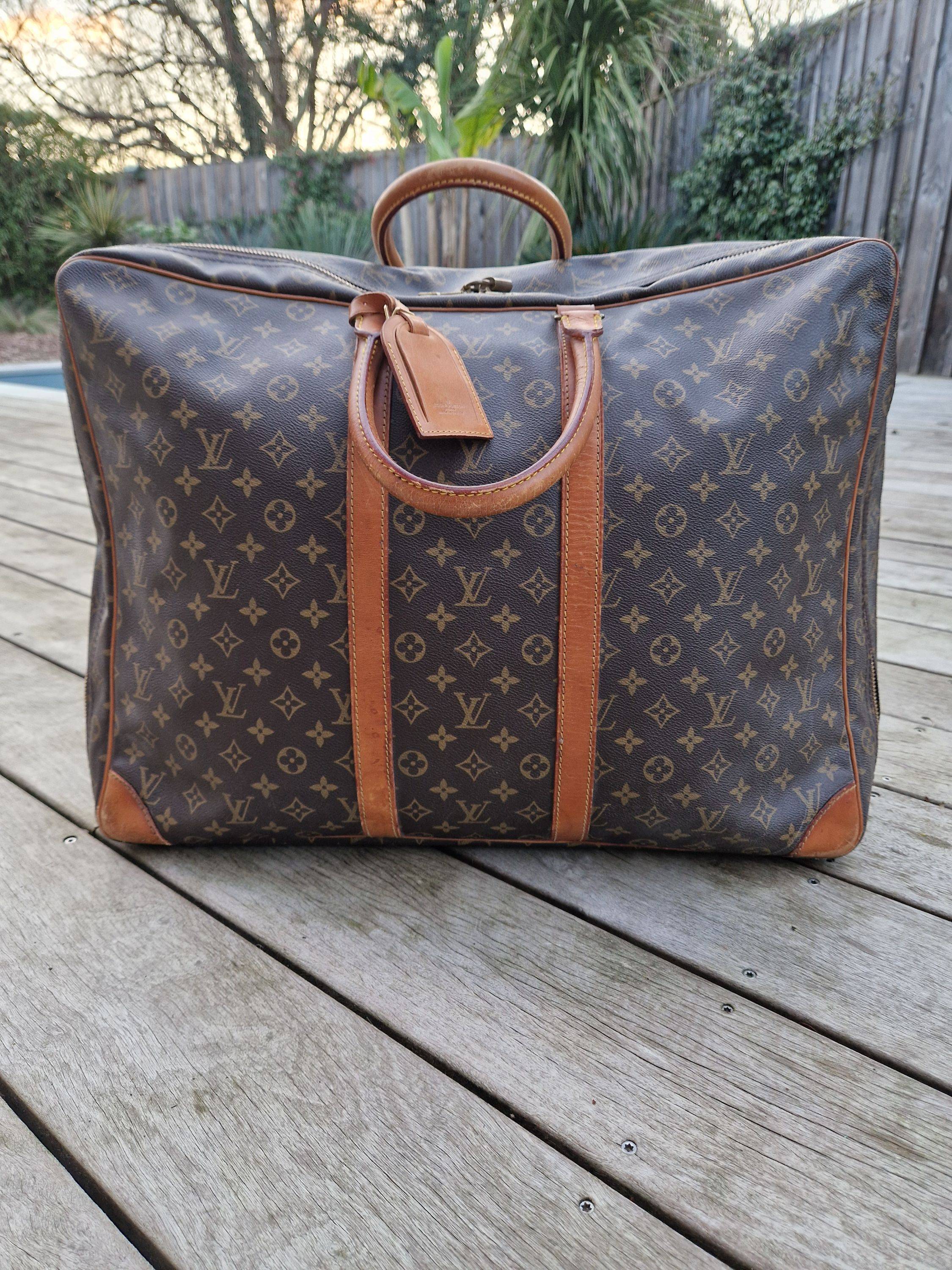 Vends valise souple Louis Vuitton monogram vintage