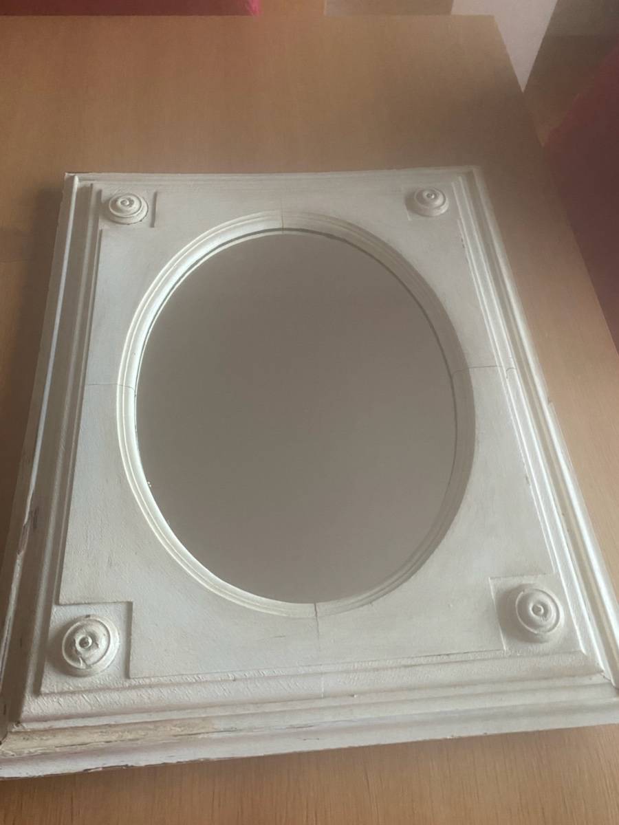 Vends une belle glace ancienne cadre en bois travaillé