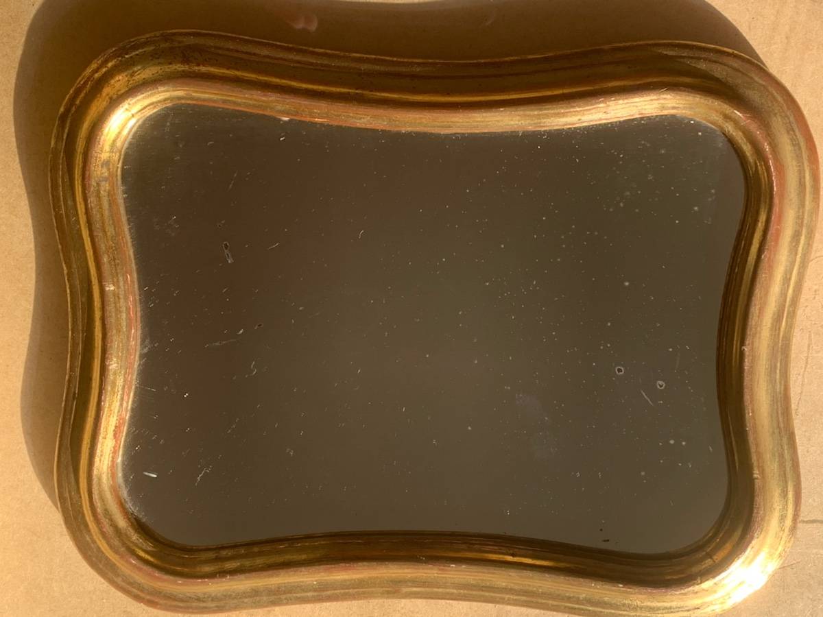 Vends jolie petite glace dorée à l’or fin aux formes ondulées