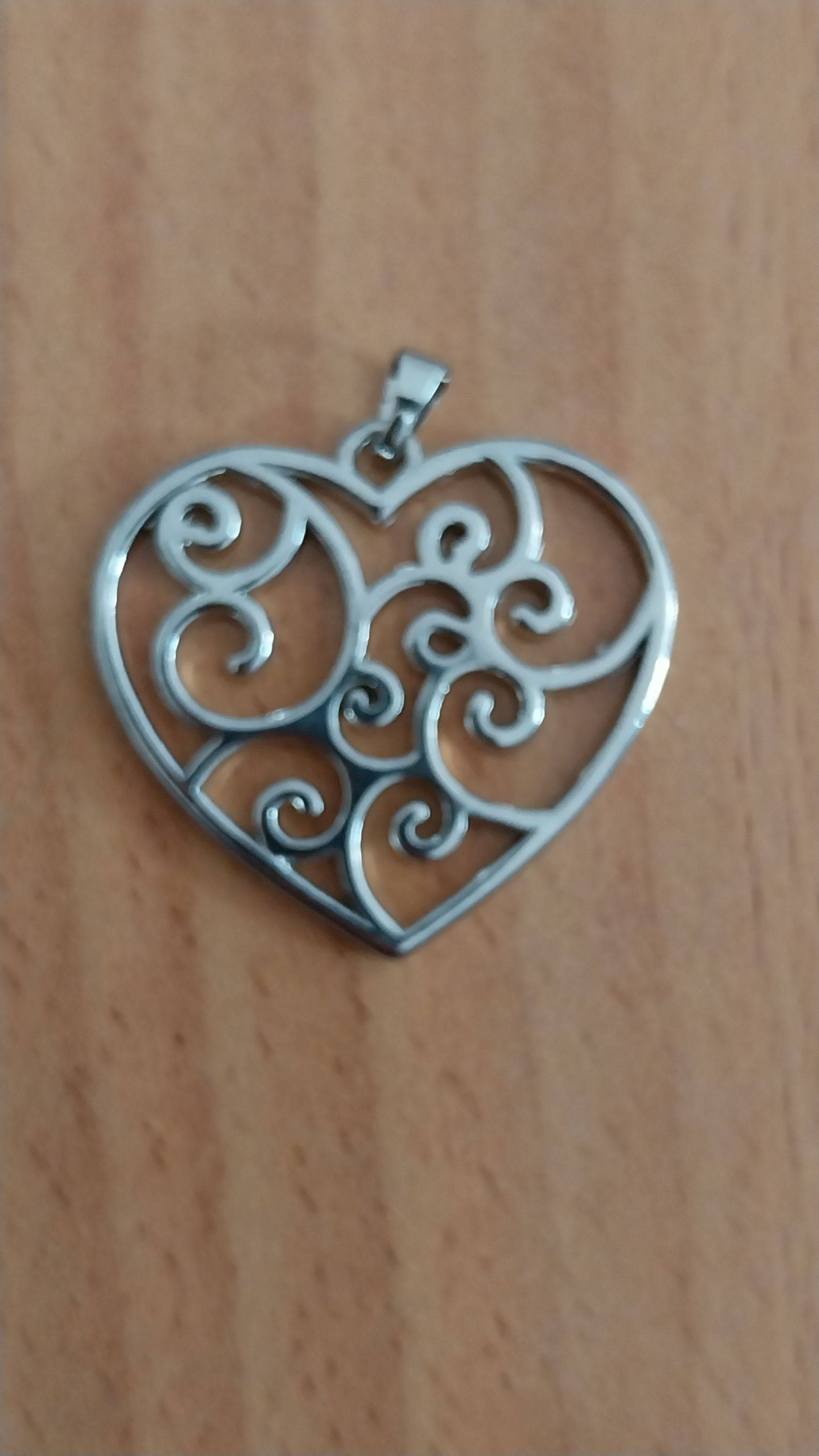 Vends un pendentif cœur