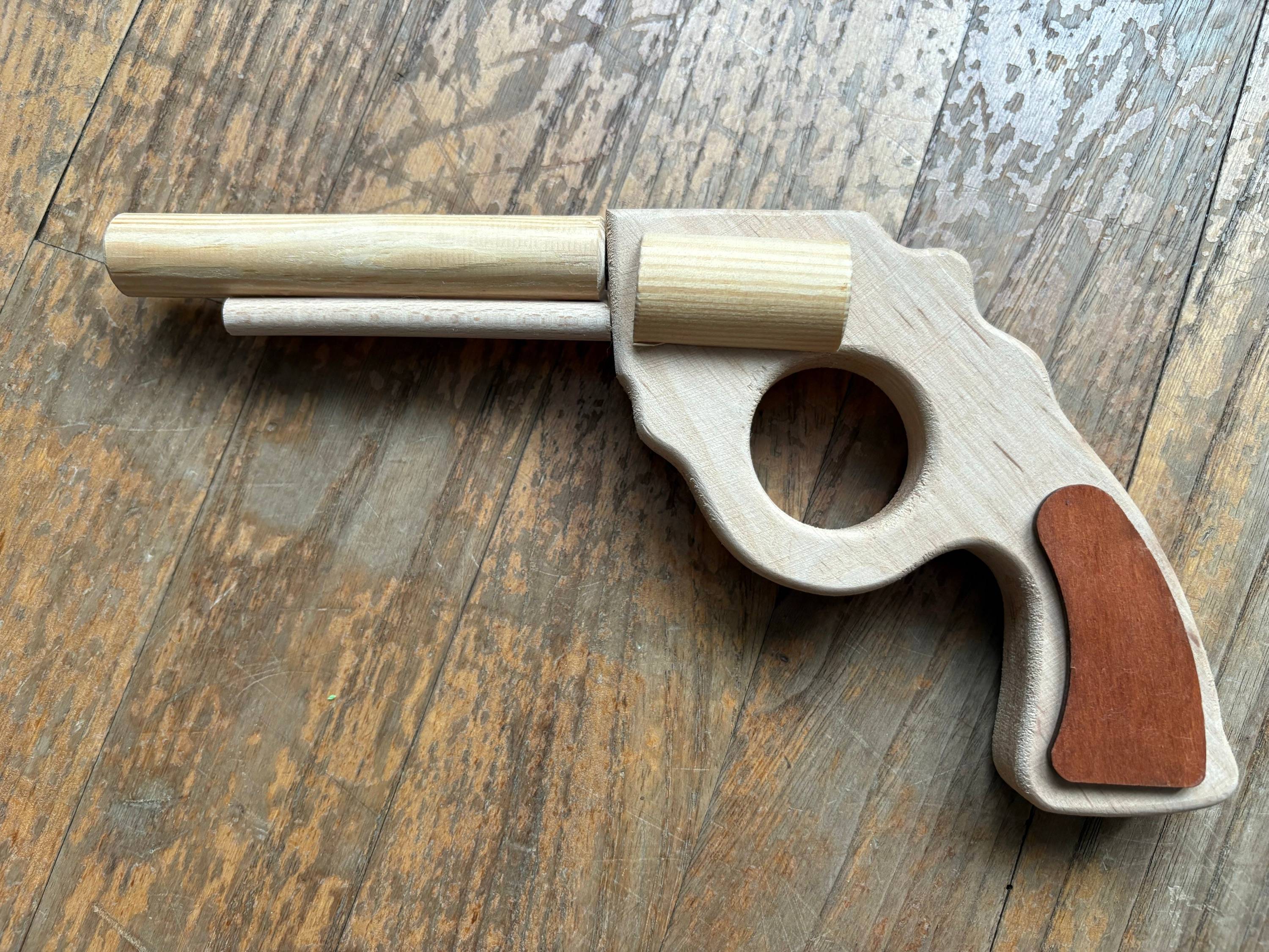 Vends pistolet en bois Oxybul