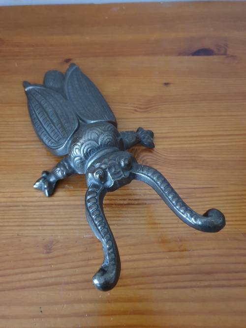 Vends tire-botte ancien scarabée en fonte 13x6x26 cm