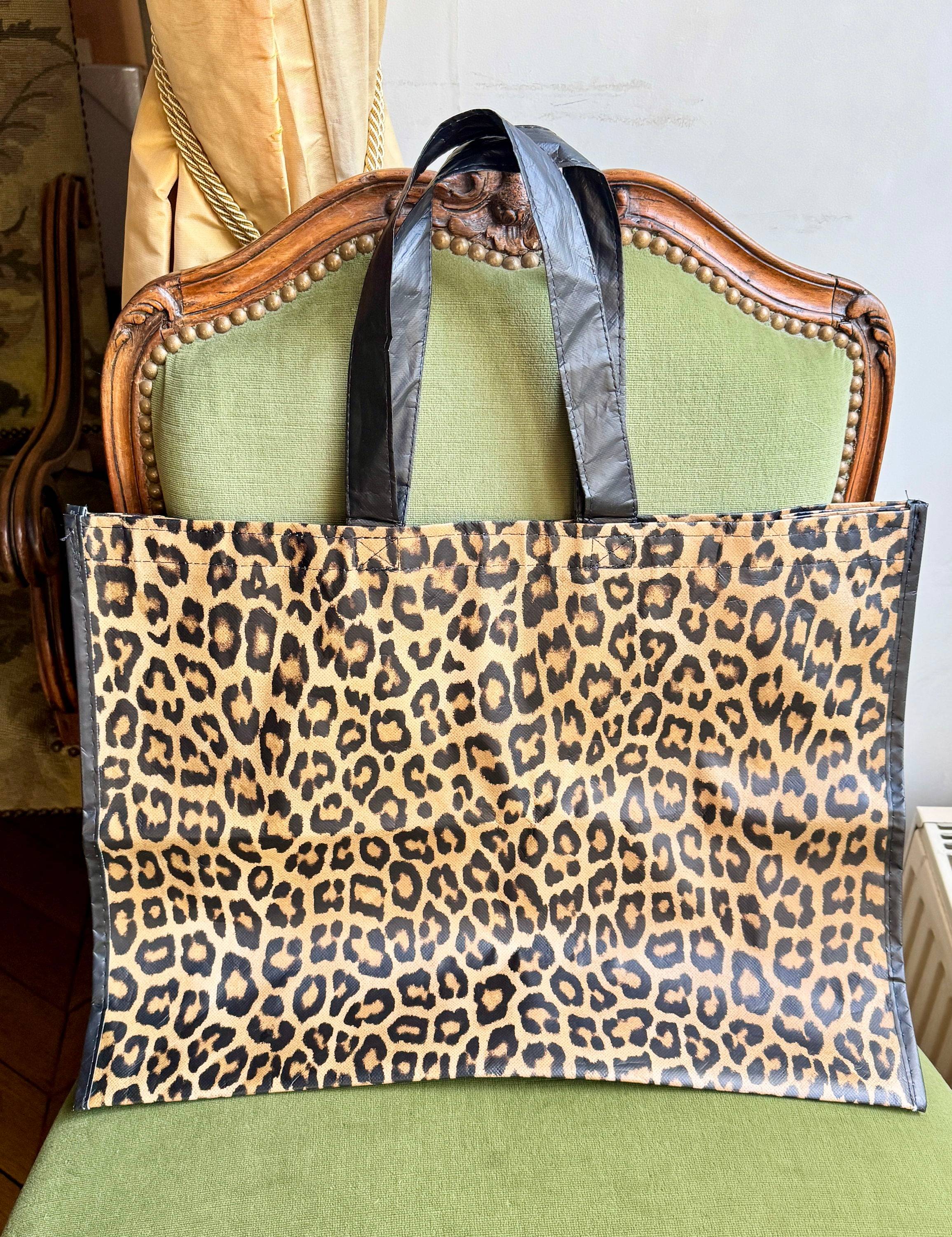 Vends élégant sac fourre-tout imperméable imprimé panthère