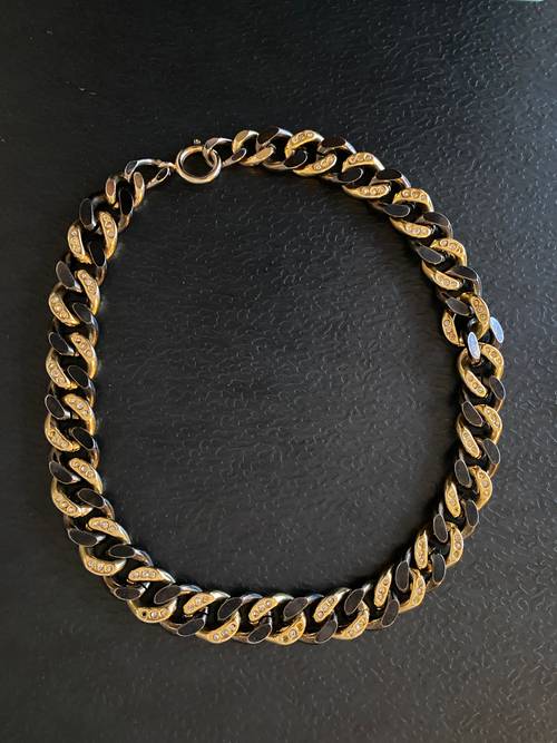 Vends collier métal doré, noir et strass