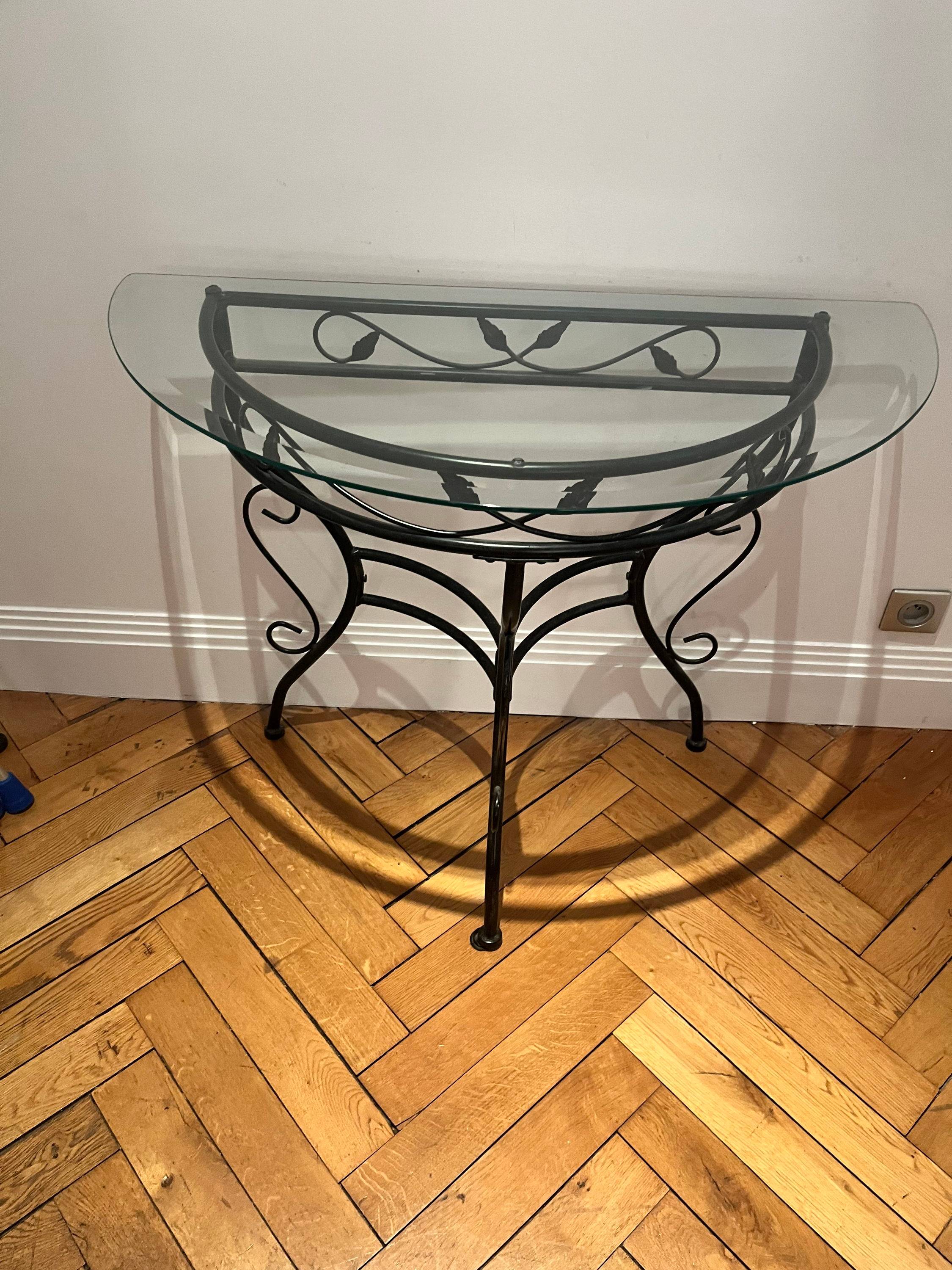 Console demi-lune en verre et fer forgé sur Gens de Confiance