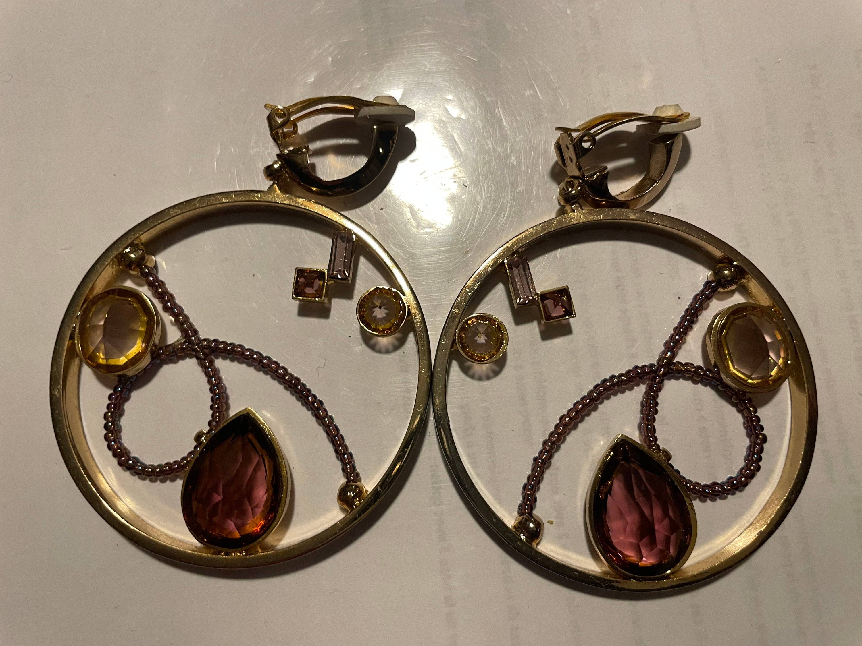 Vends clip doré + pendant strass et enfilage sur cercle doré Antigona