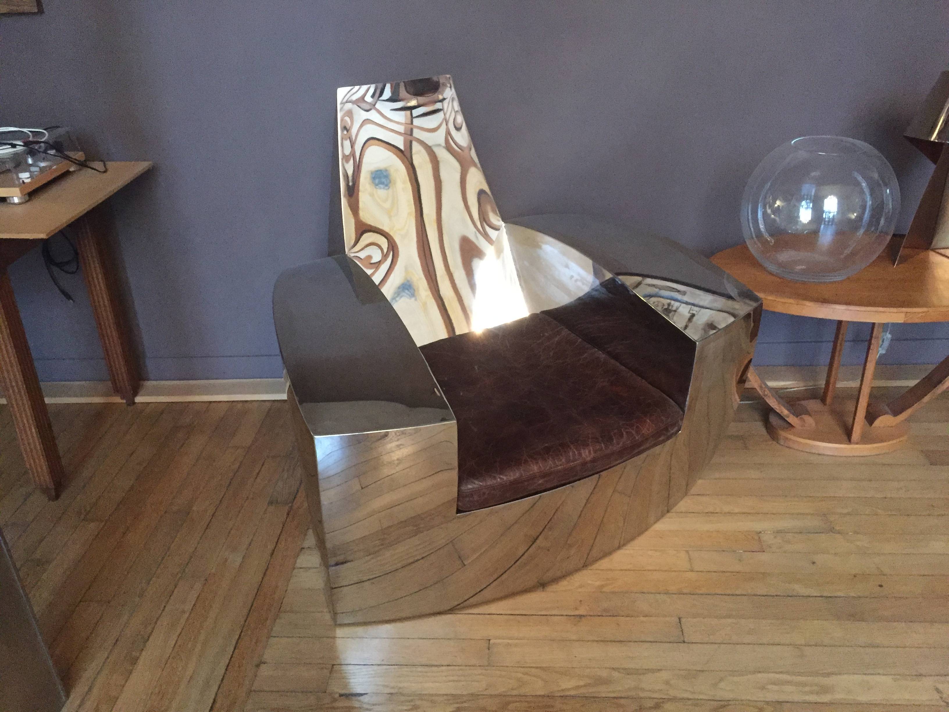 Vends fauteuil design, inox et cuir