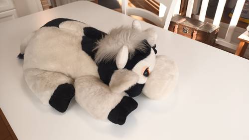 Très jolie peluche grande vache couchée