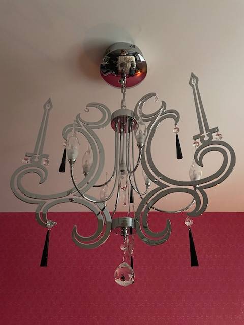 Lustre en métal acier brillant