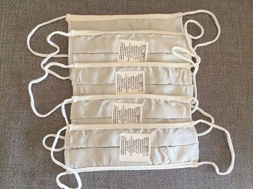 5 masques pharmacie tissus neufs