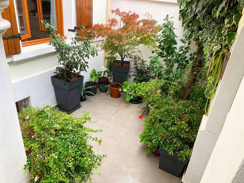 Vends mieux qu’un appartement, une maison de ville avec extérieur verdoyant - 2 chambres