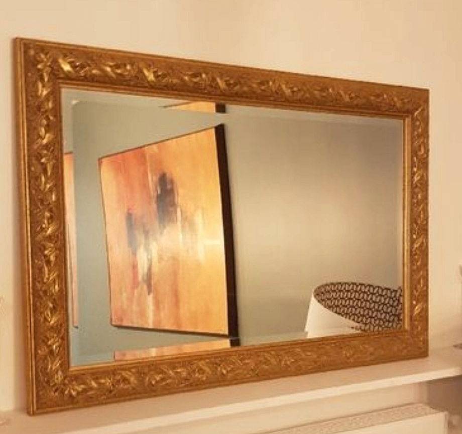 Miroir bois brut sculpté et miroir biseauté