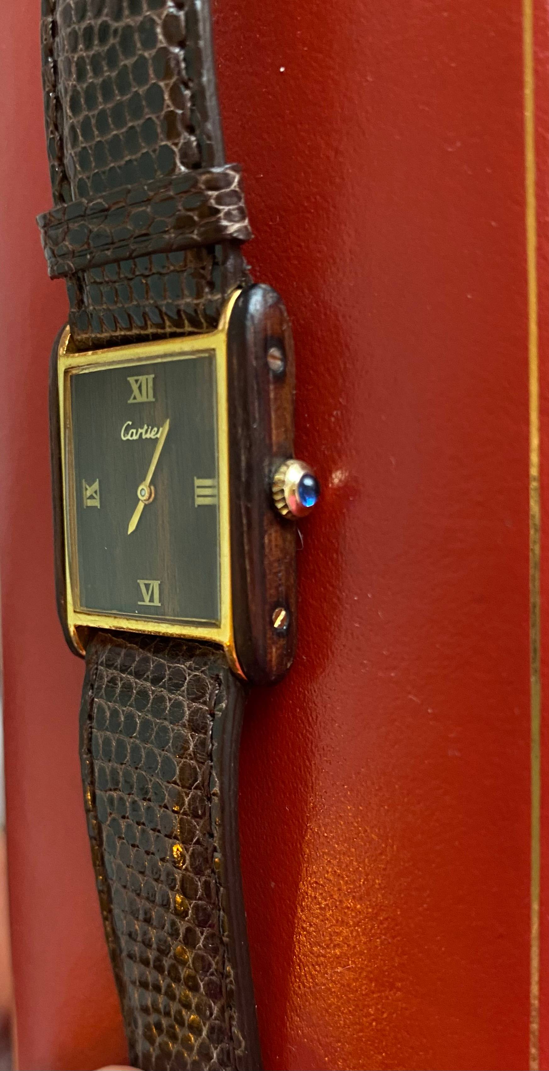 Montre Cartier Tank wood sur Gens de Confiance