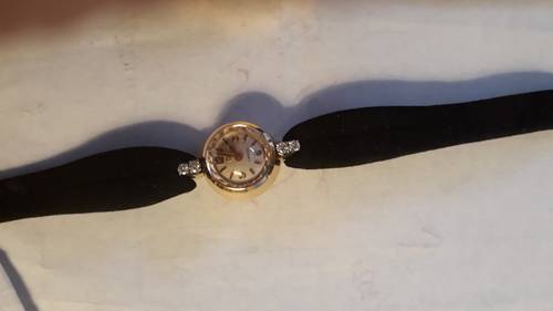 Montre Omega femme or 18 K