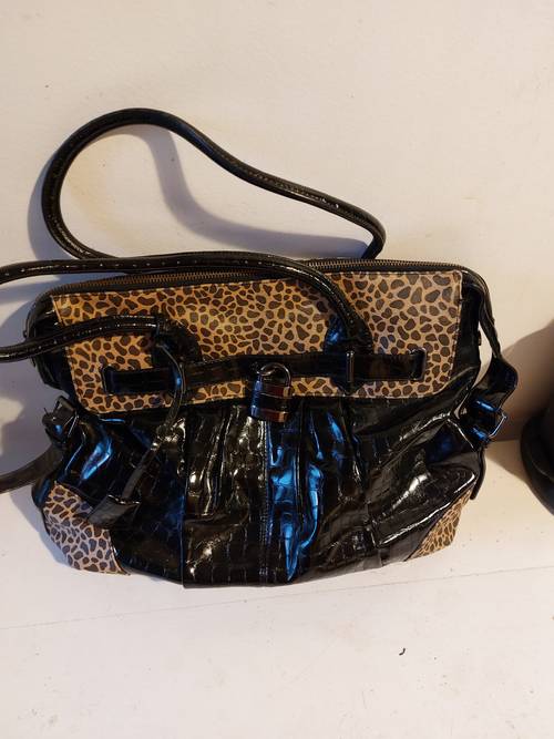 Sac à main noir et panthère vinyle bon état