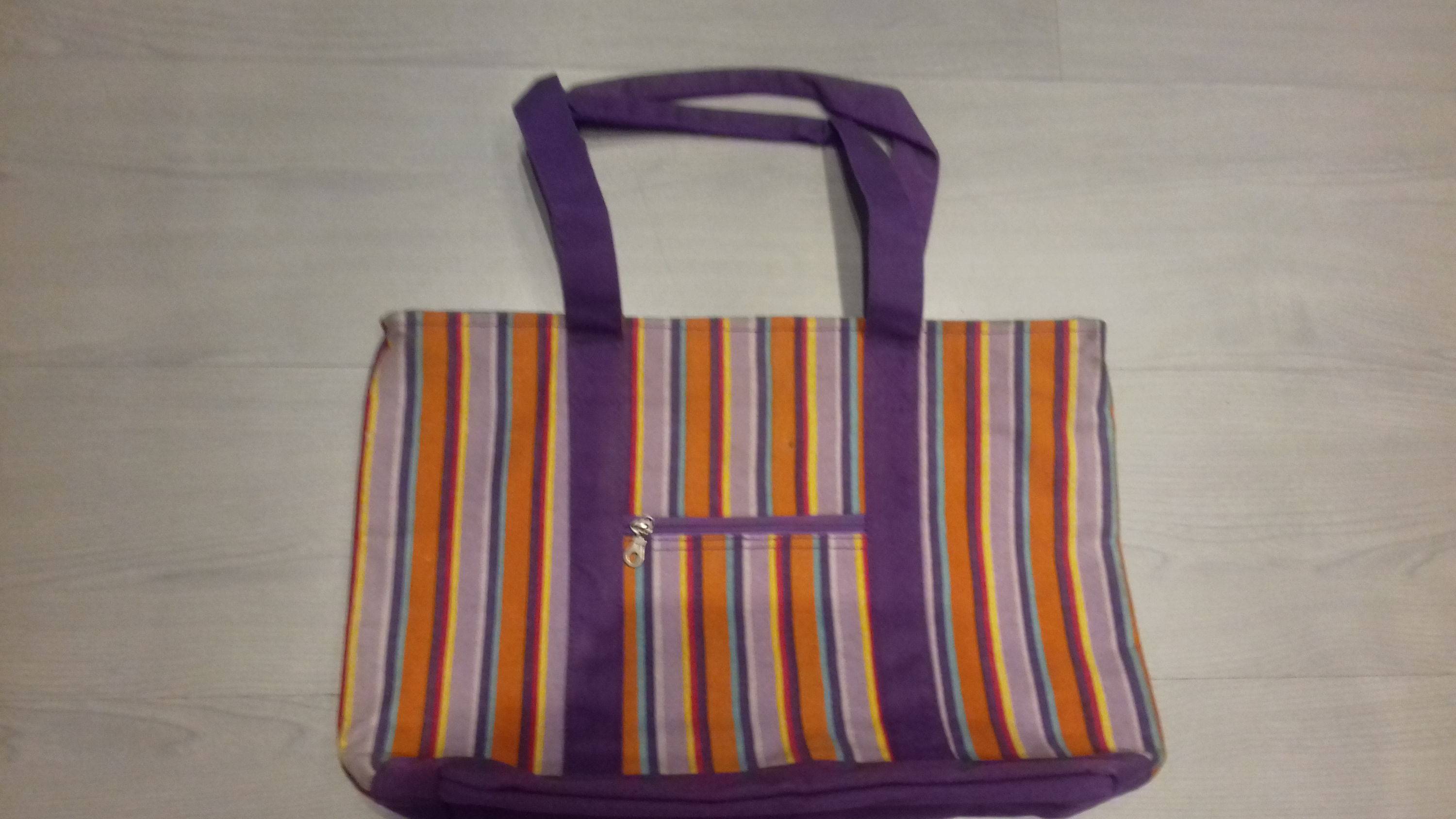 Vends sac de plage en toile rayée orange et violet neuf