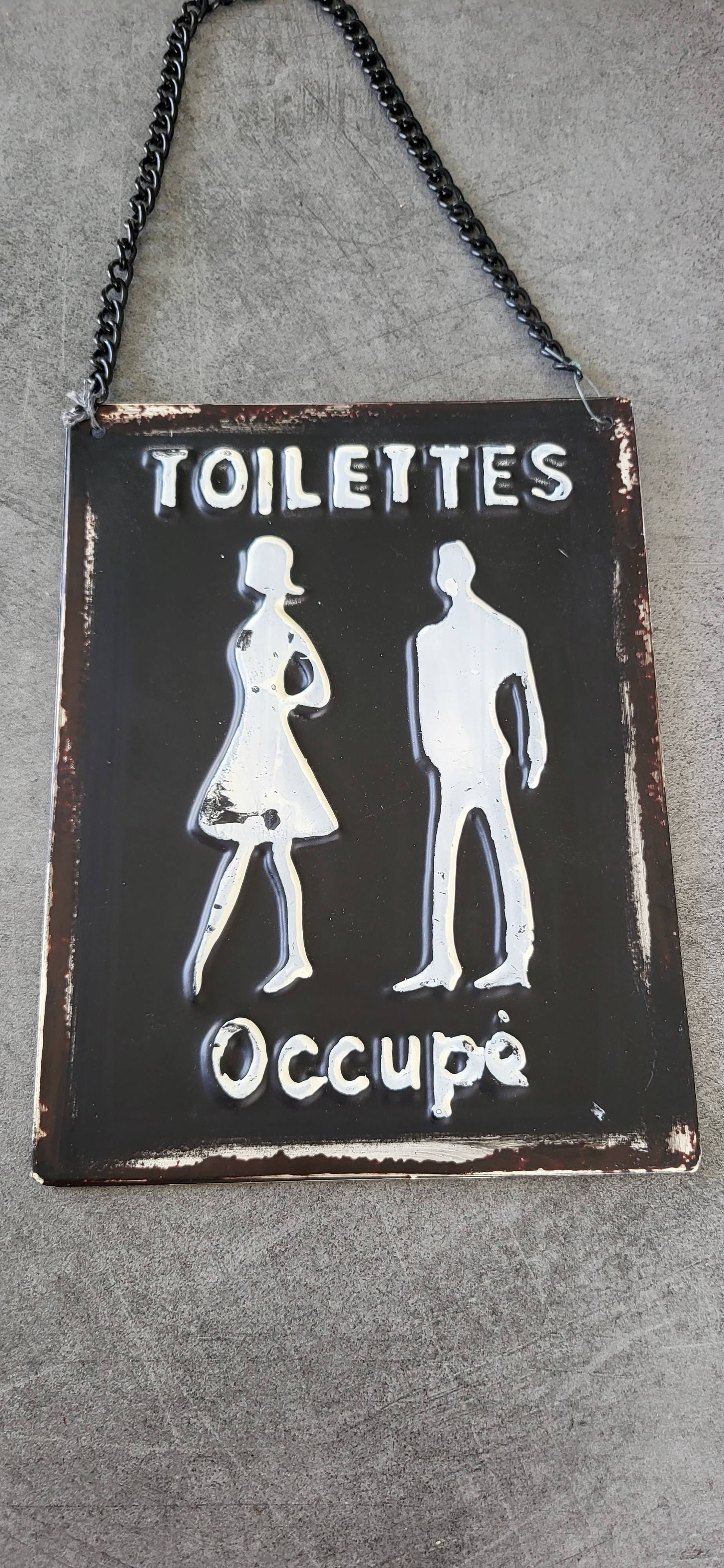 Plaque métal pour toilettes